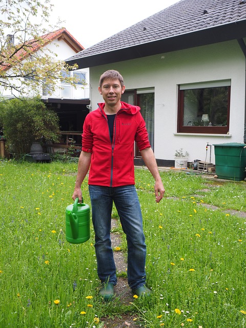 Gardener with watering can